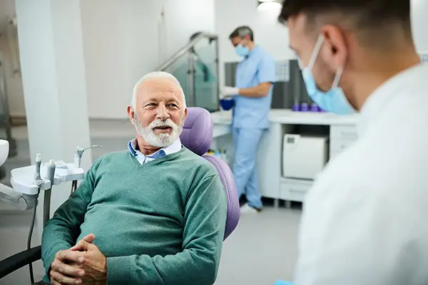 An older male patient sitting in exam chair at Sleep Apnea Solutions of Cincinnati in Cincinnati, OH